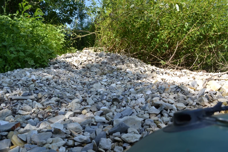 Босиком здесь не походишь. Эти камни вынесло на берег водным потоком, от сильных, ливневых дождей.